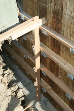 The author uses a simple forming system from Meadow Burke that includes durable reusable hardware for attaching snap-ties, walers, and upright braces.