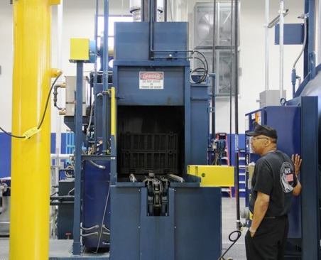 This is a hardening furnace. After baskets of tool parts are placed inside the door is closed and the interior heated to something approaching 1,600 degrees—at which point the parts are quenched (cooled) by lowering them into an oil bath. Rapid cooling hardens the metal by changing its structure and chemistry. The next step is to anneal the parts by putting them in a furnace, heating them to a particular temperature, and then allowing them to cool slowly over a period of time. This brings the metal to a specified level of hardness, so pieces are hard but not brittle.