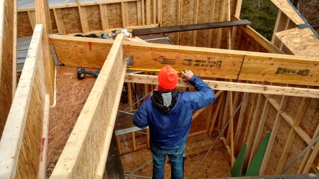 The LVL rafters for the low-slope roof system were set out of square to the beams that they tied into.