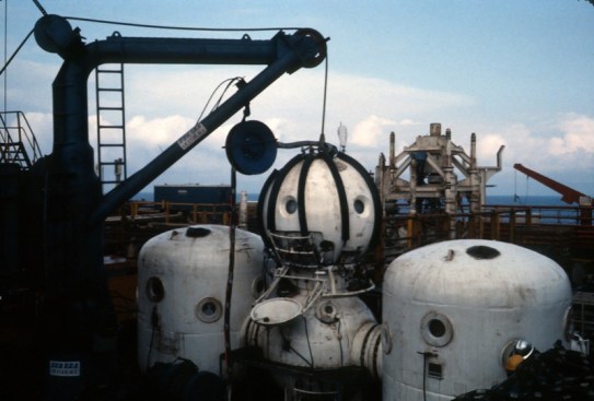 Shown here is a "saturation diving system" - a pressurized chamber used to acclimate divers to extreme deep sea pressures - like the one Bill and his coworkers lived in when working in the North Sea. The “diving bell” on top would get craned into the water and they would descend, two people at a time, to the job site, some 400 to 600 ft. below the surface. (Photo courtesy Gary Kane)
