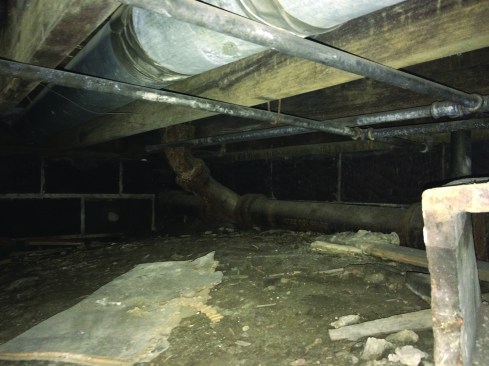 The dirt crawlspace created a huge moisture load for the interior.