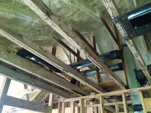 Because the roof was insulated, some ducts could also be routed through the attic.