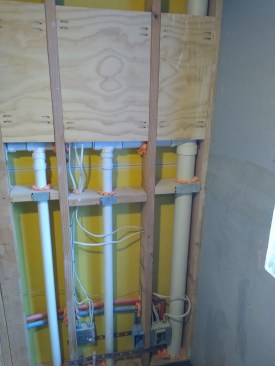 Air-sealing is not relegated to one phase of construction. Throughout the entire build, we continually seal anywhere air can penetrate or convect, as seen in this interior plumbing wall after the shell was sealed. Reducing air movement in walls is also important for improving fire safety, deadening sound (sound travels through air), and reducing unwanted moisture movement. In this case, these walls will be tiled on both sides.