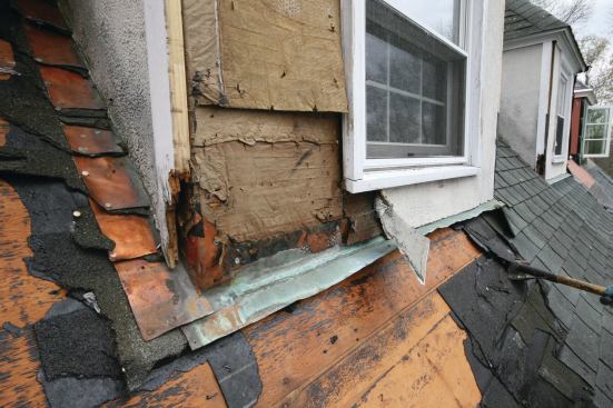 Many corner flashings, even if made from copper, are modified step flashings, cut in place to wrap the corner of the wall or chimney, while the leg running along the roof slope laps the apron.