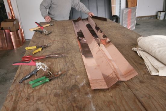 The apron is bent to the roof slope. The angle is under-bent to provide tension, which helps the apron stay tight to the roof when installed.