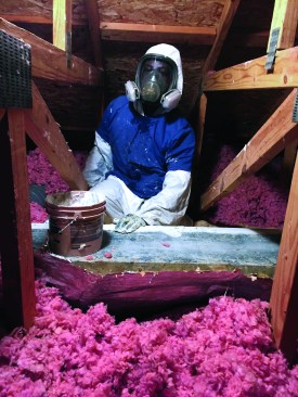 An Edge Energy installer seals a trunk line in an existing home before burying the duct with blown cellulose—a safe and routine practice in mixed climates, says Gary Boyer.