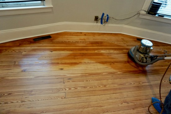 He spreads the oil quickly in a figure 8 to smear it on the surface ...