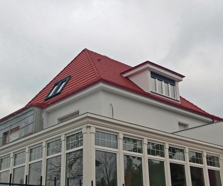 A 1920s-era home in the Biskupin neighborhood of Wrocław. Nearly all the homes here are built to the same durable pattern that homes have been built to in Poland since the Middle Ages—with thick masonry walls, inset windows, and steep tile roofs surrounded by ample gutters and good overhangs.