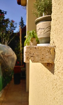 Stone window sill with cut-in drip edge.