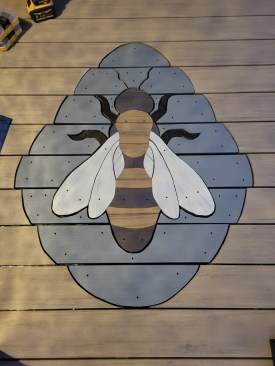 The author face-fastened the assembled bee and the hive pieces to the blocking. Later, he filled in the holes with matching Cortex plugs.