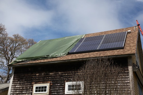 The company had originally promised to remove the panels so the roof could be repaired at the same time the inspection was done. With only two crew members available to do the work, the panels could not be removed safely, so the crew redeployed and resecured the tarp.