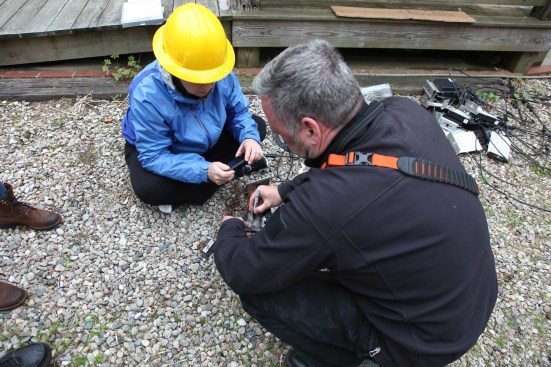 After examining each part, a member of the team labels the part and places it in a zip-lock bag to keep as evidence.