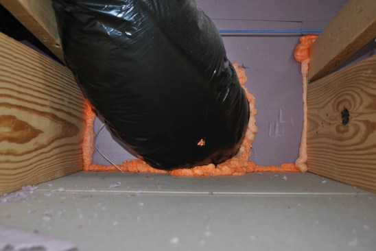 They seal the foam board to the framing with gun foam, sealing duct
penetrations at the same time.