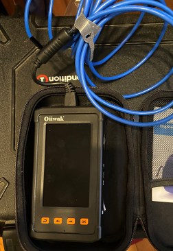 For looking inside building cavities, Robinson uses an Oiiwak borescope with a digital display.