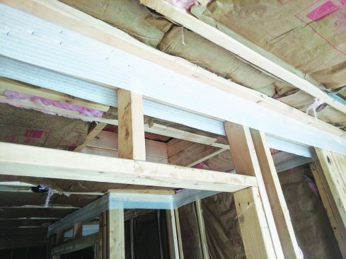 When drywall is installed, the sill sealer will form a gasketed seal and prevent air infiltration at the top of the wall.