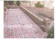 Here's a photo of the installed brick patio, with the layout lines superimposed on the photo. Note how the pattern is centered along both the length and width of the patio.