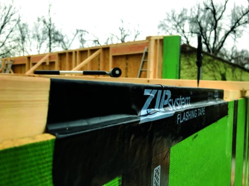 Continuous air barrier. Air leaks at the top of the wall are sealed with a combination of Zip Tape and Grace Vycor Plus. First, the sheathing is taped to the top plate.