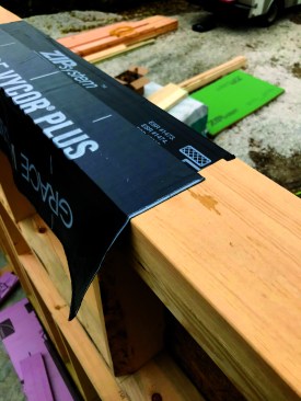 Strips of 9-inch Vycor Plus lap over this tape.