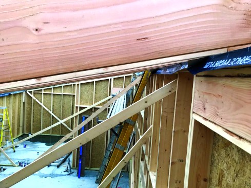 The Vycor Plus strips extend inside. There, they will be taped to strips of OSB that will be installed at the perimeter of the ceiling, forming the air barrier for the lid.