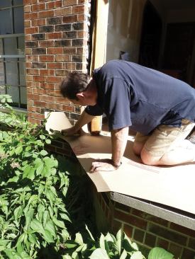 Builder Board paper worked well for templating the bay. Folds mark the location of the limestone sill.