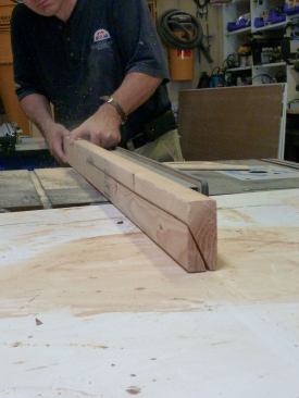 The template was used to lay out the profile of the angled corner posts, and the dimensions were transferred 

to a section of 2x4. For each post, a bevel was ripped on one side of a pair of 2x4s.