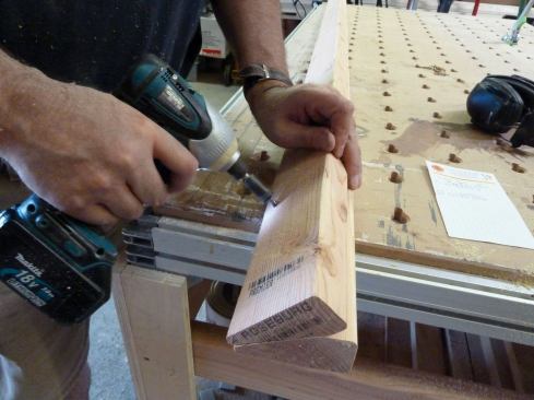 The pairs of  beveled 2x4s were screwed together to ensure a straight corner post.