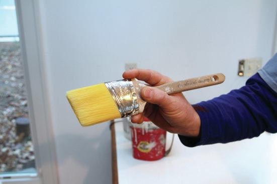 Choking up your grip on the brush gives better control for detail work.