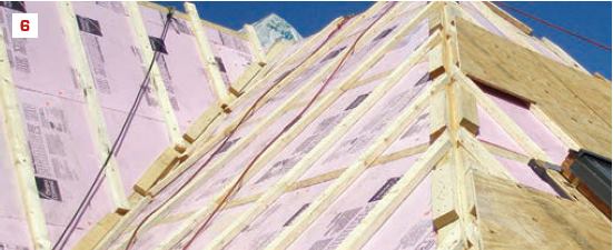 If rigid insulation is added above the deck, it needs to be in contact with the roof sheathing. If roof ventilation is added (as required for some roofing), it must be added above the insulation.