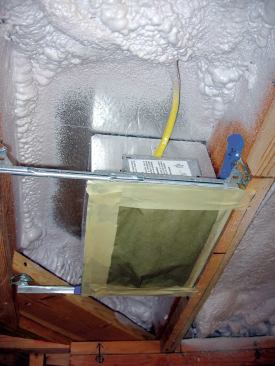 When recessed lighting is unavoidable, best practice calls for installing a piece of foil-faced rigid foam above the fixture ...