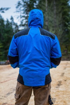 The Chelsea Shell jacket has an adjustable hood and drop hem in the back for added protection from the elements.