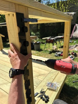Fastening is easier with bars facing away from where he needs to work with the template.