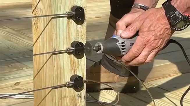 When a cable is fully tensioned, he cuts it with an abrasive wheel on a Dremel tool.