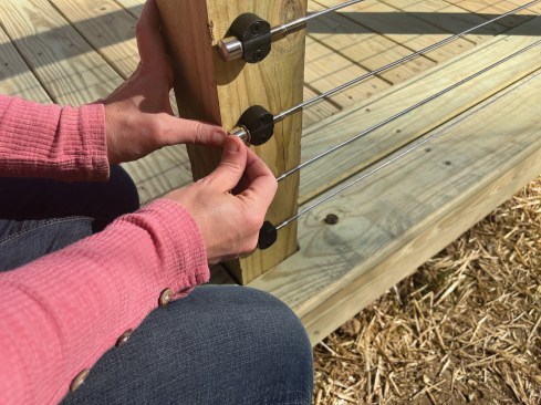Each cut end is finished off with a decorative metal cap.