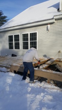 When replacing an existing deck, the author tries to schedule demolition in the late fall, after deck season but before cold weather sets in. In New England, though, Mother Nature sometimes has other plans.