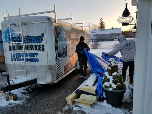 To keep materials dry and frost-free, the author equips his crews with plenty of tarps.