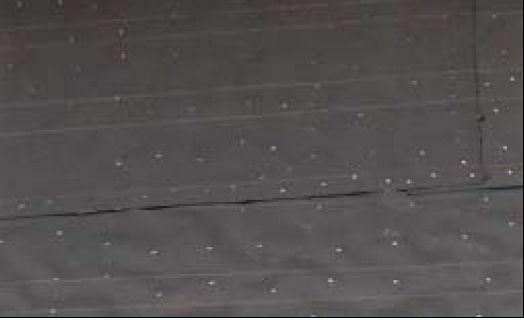Every staple through the water-resistive barrier is a potential water leak, so don’t get trigger happy, as this installer did.