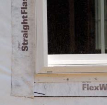 Proper window flashing. The sequence of flashing a window is critical. Begin with a sill flashing that covers the rough sill and has a bottom flap that laps over the top of the housewrap as shown. This will ensure that any water that leaks through the window drains out. The jamb flashing should go on after the window has been installed, and should lap over the window flange to prevent wind-driven water from getting past the window into the rough opening.