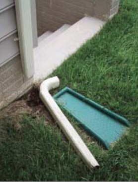 Maintaining drainage. When I inspect a home for moisture problems, I look for signs of lack of maintenance. For example, here the downspout is disconnected from the leader, so all the water that runs off the roof is being funneled near the foundation. This can create a tremendous moisture load on the home.