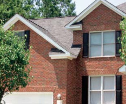 Design solution. Here’s one example of how to detail intersecting roofs to
avoid a horizontal valley. By keeping the gable ends on different planes, the valley is allowed to run unbroken, so water can drain away freely.