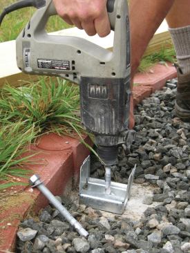 Most post bases have an elevated plate that prevents the bottom of the 4x4 or 6x6 post from coming in direct contact with the concrete. 