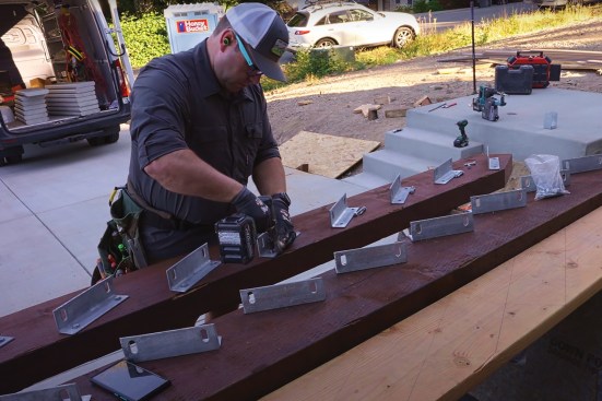 3/8-inch-diameter lag screws fastened the mounting brackets to the stringers.