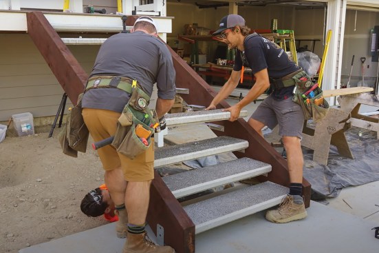 The rest of the treads were then installed, with a 1/4-inch gap for drainage between the treads and stringers.