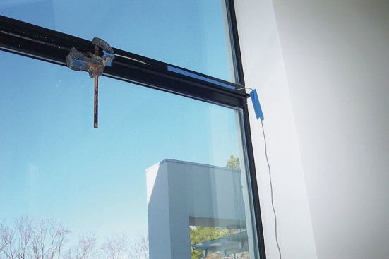  A remote temperature sensor on the inside of a casement window records surface temperatures. 