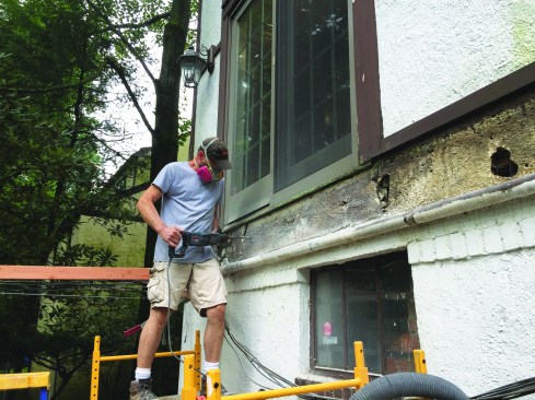 The stucco was cut away.