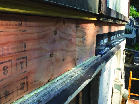 After resheathing, the crew flashed the assembly with Vycor.