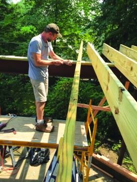 A string line established a reference elevation for the out-of-level girder.
