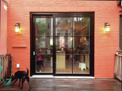 The new brick was painted to match the existing brick. 