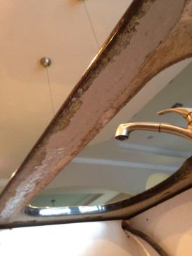 Here you can see the underside of a repaired countertop. Once the rod was removed, the slot was cleaned with acetone and then packed with anchoring epoxy.