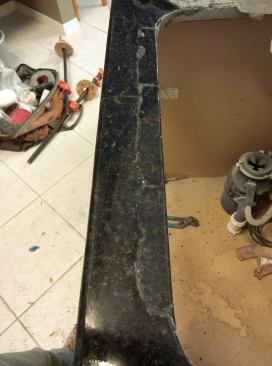 Here is the Uba Tuba repair after glue-up and clamping, but before grinding and polishing. 