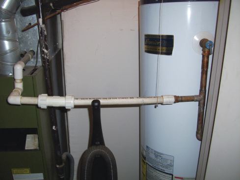 The discharge pipe from a T&P valve can’t have tees, and it can’t tie into other lines, such as the condensate line from the furnace.